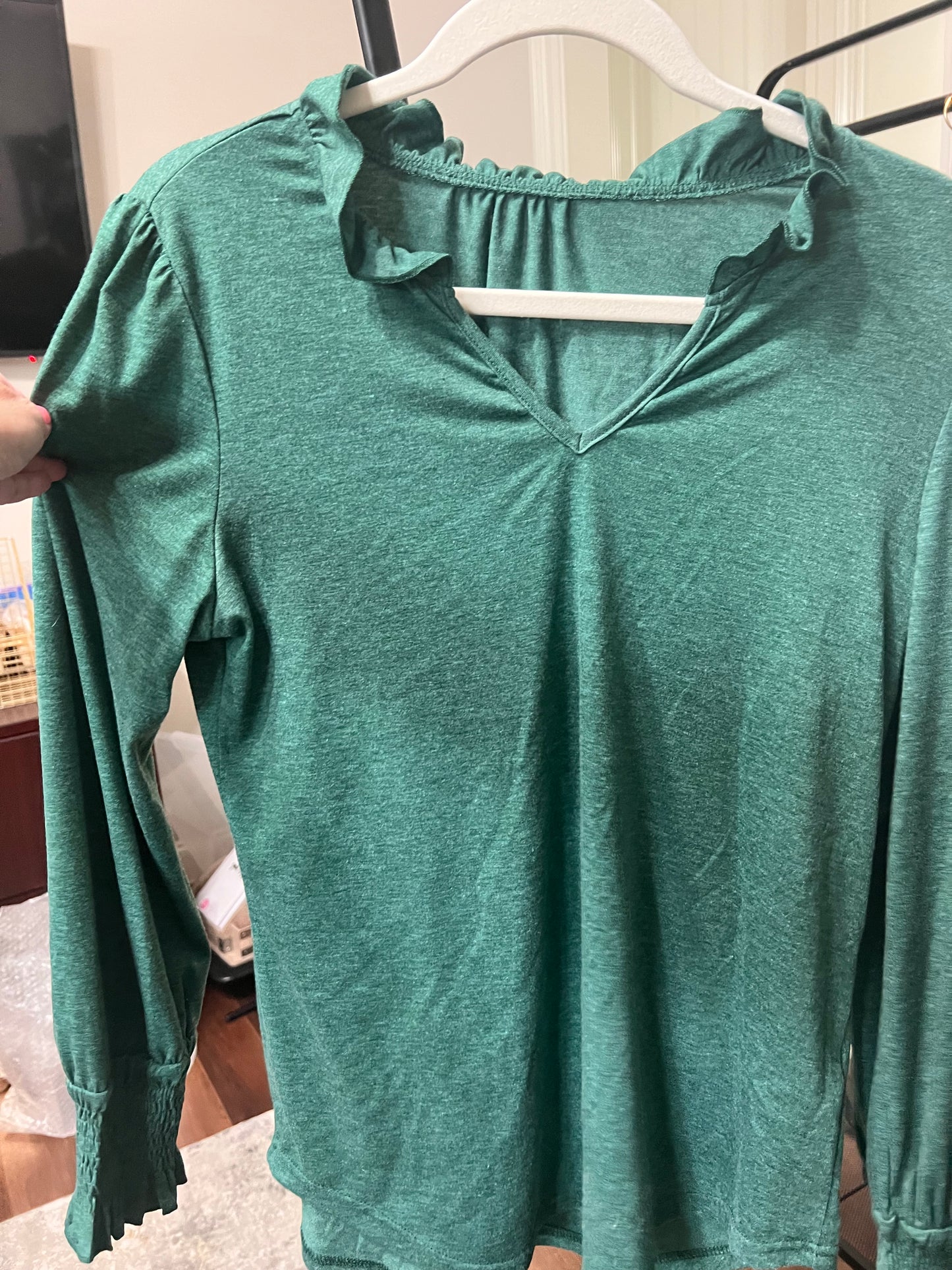 Green ruffle long sleeve shirt