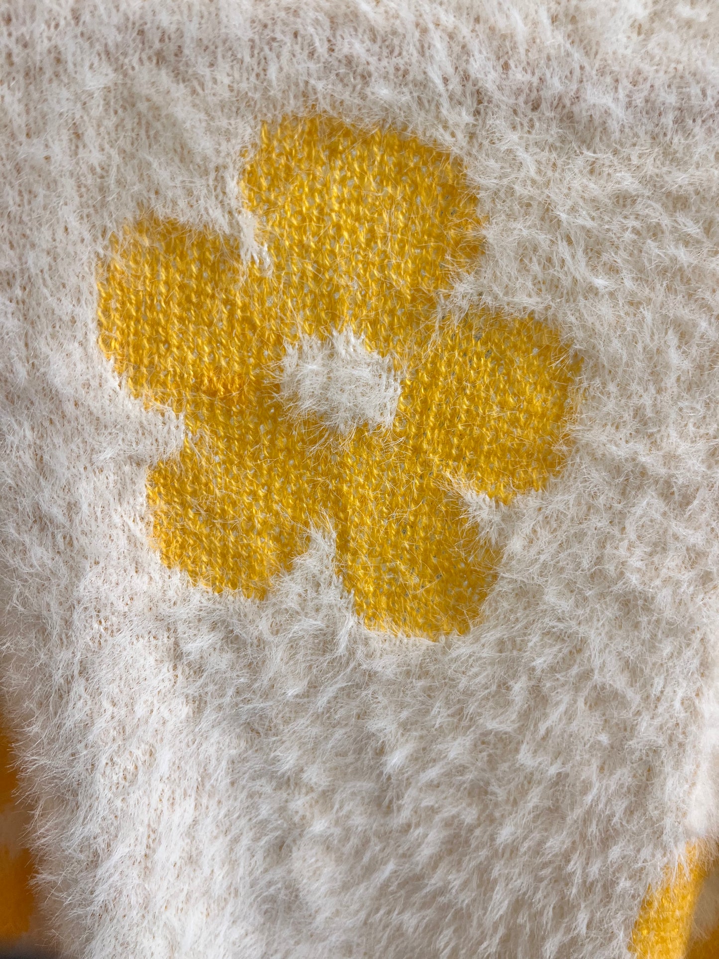 White and yellow fuzzy cardigan