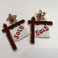 SOLD sign earring